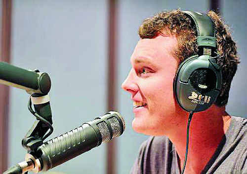 Wollongbar’s Christian Layland making a podcast for The Football Sack at SCU’s radio studio. Wollongbar’s Christian Layland making a podcast for The Football Sack at SCU’s radio studio.